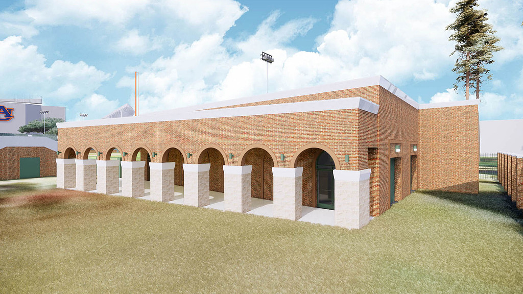 A building with a grass lawn.