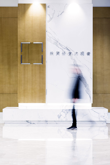 A person standing in front of a door.