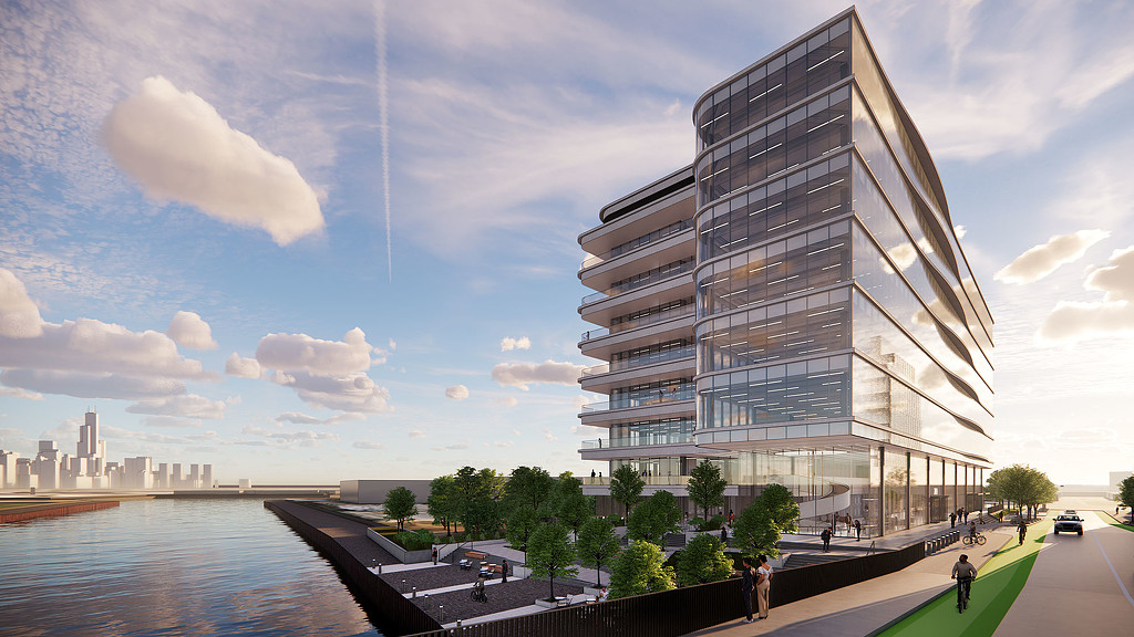 A building with a body of water in the front.