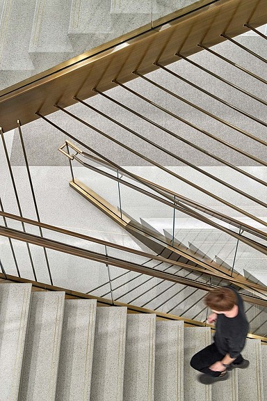 A person walking up a staircase.