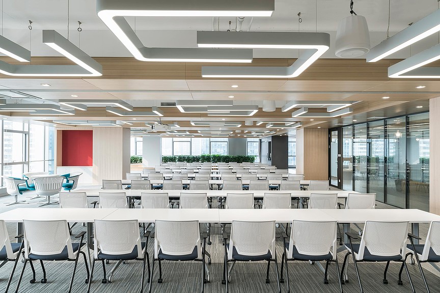 A room with tables and chairs.