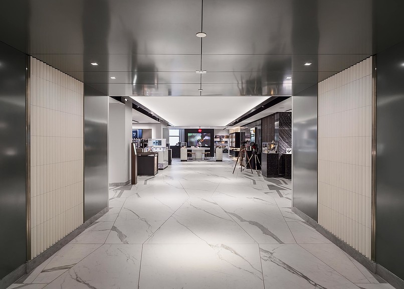 A long hallway with people.