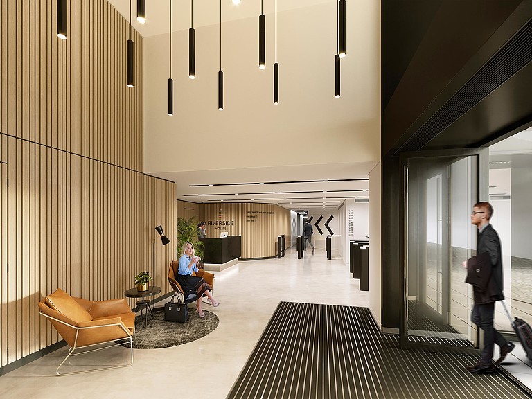 A man and woman in a lobby.