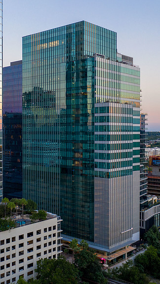 A tall glass building.