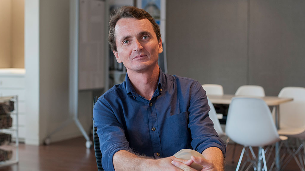 A man sitting in a chair.