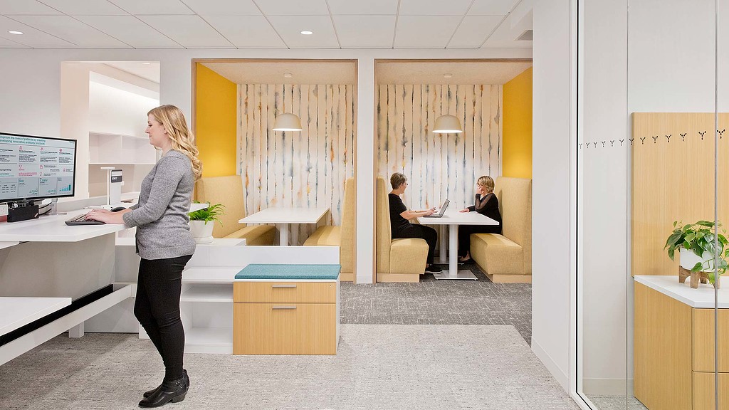 A person standing in an office.