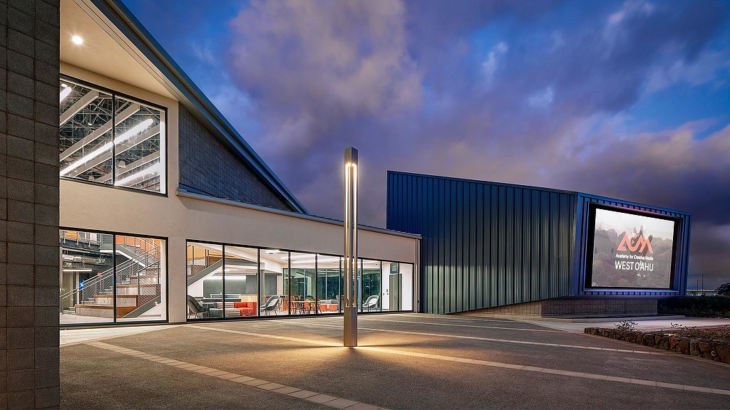 A building with a large screen.