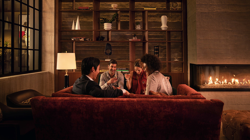 A group of people sitting on a couch.