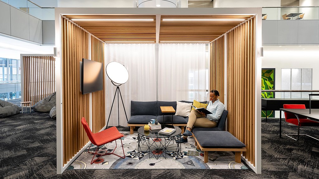 A person sitting on a couch.