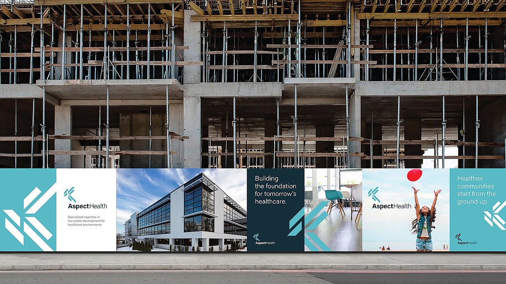 A building with a sign in front.