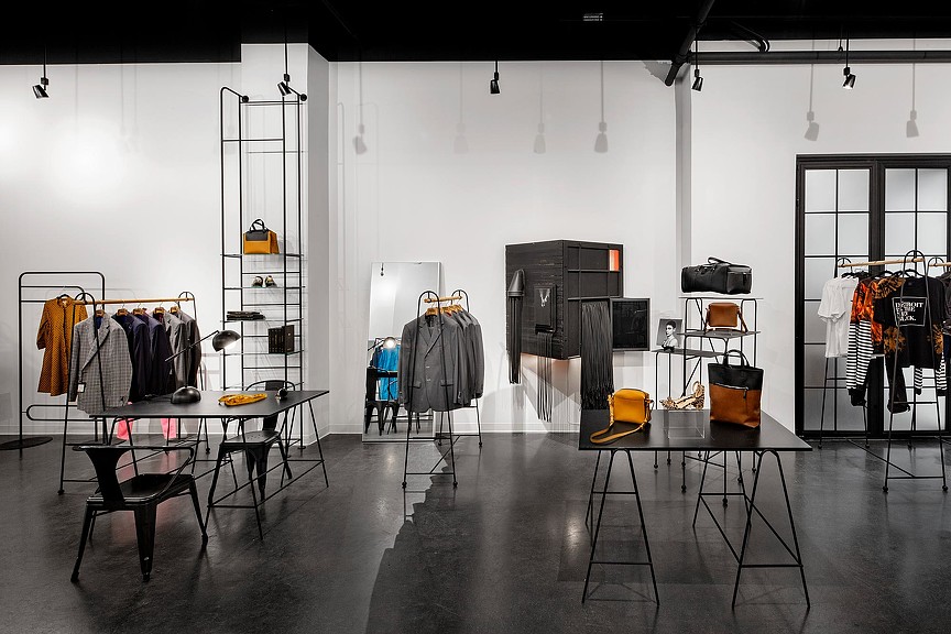 A room with a table and chairs.