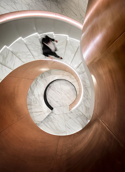 A person sitting on a circular object.