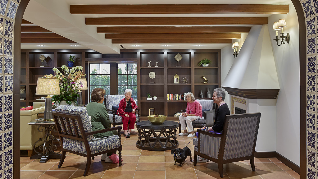 A group of people sitting in chairs.