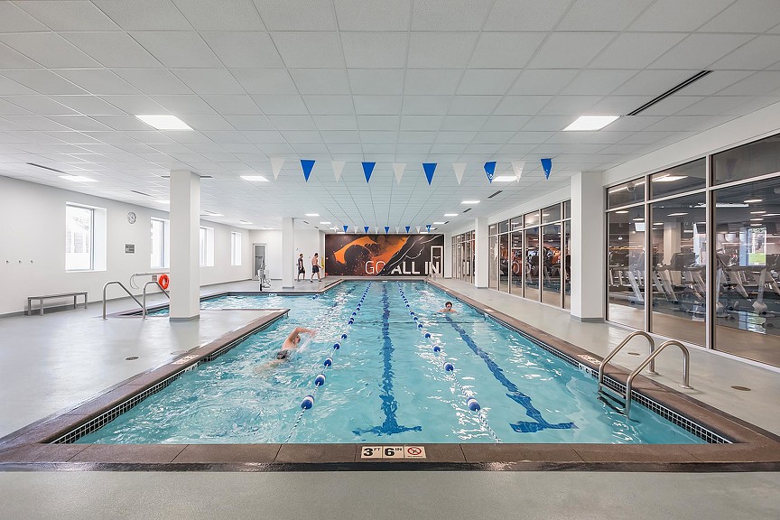 A swimming pool in a large building.