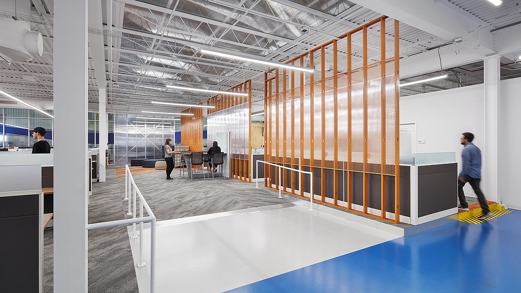 A group of people in a building.