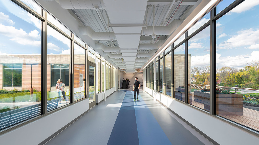 A long hallway with windows.