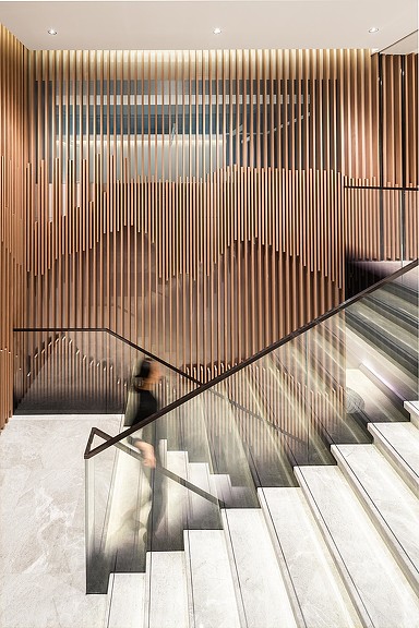 A person walking up a flight of stairs.