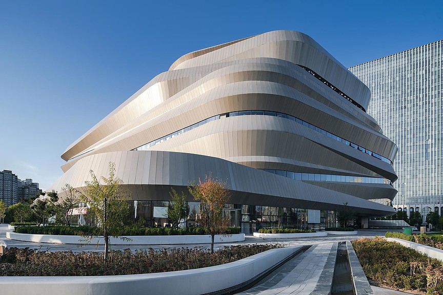A building with a curved roof.
