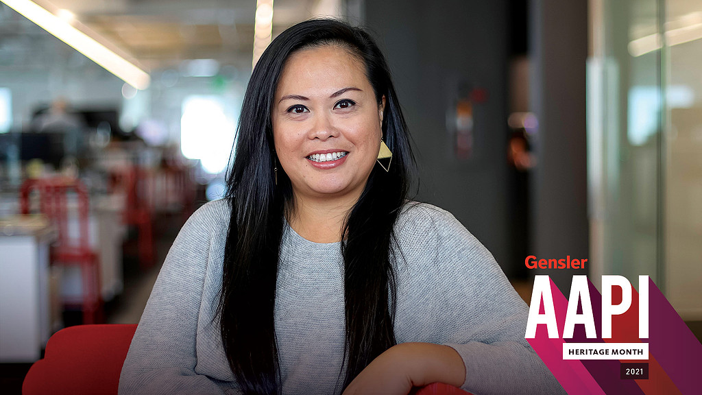A woman with long black hair.