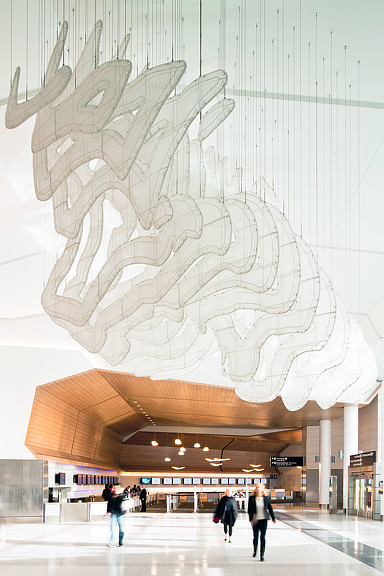 A large ceiling fan in a building.