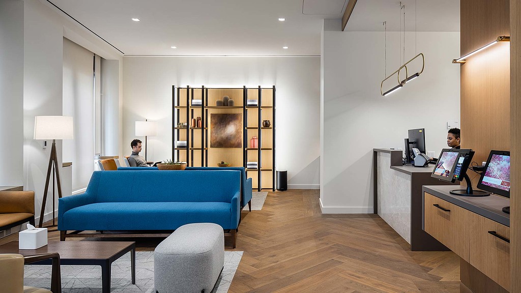 A man and woman in a room.