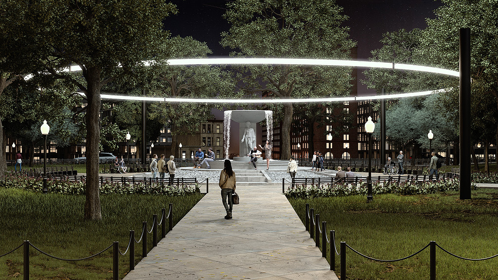 A person walking on a path in a park.