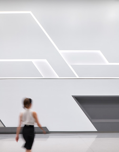 A person walking in a room.