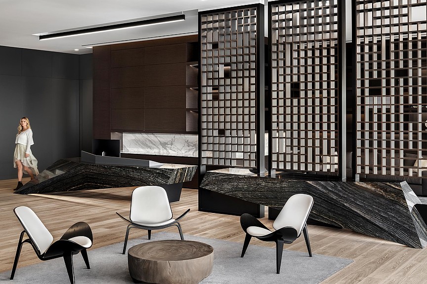 A room with chairs and a table.