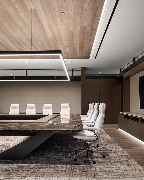 A room with chairs and a table.