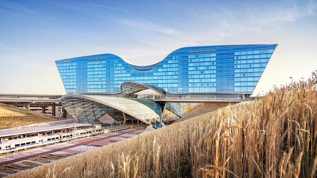 A large building with a glass front.