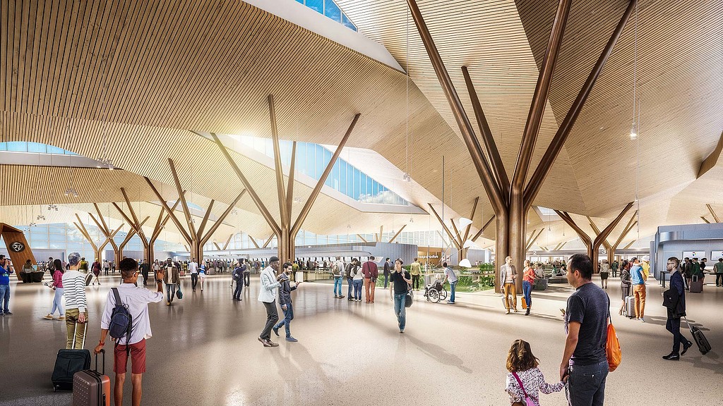 People walking in a large building.