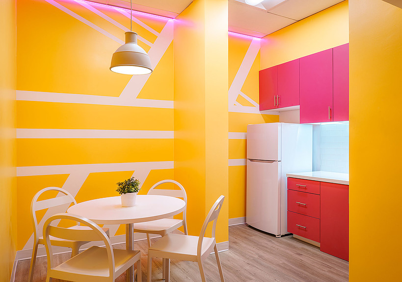 A bright yellow and pink room.