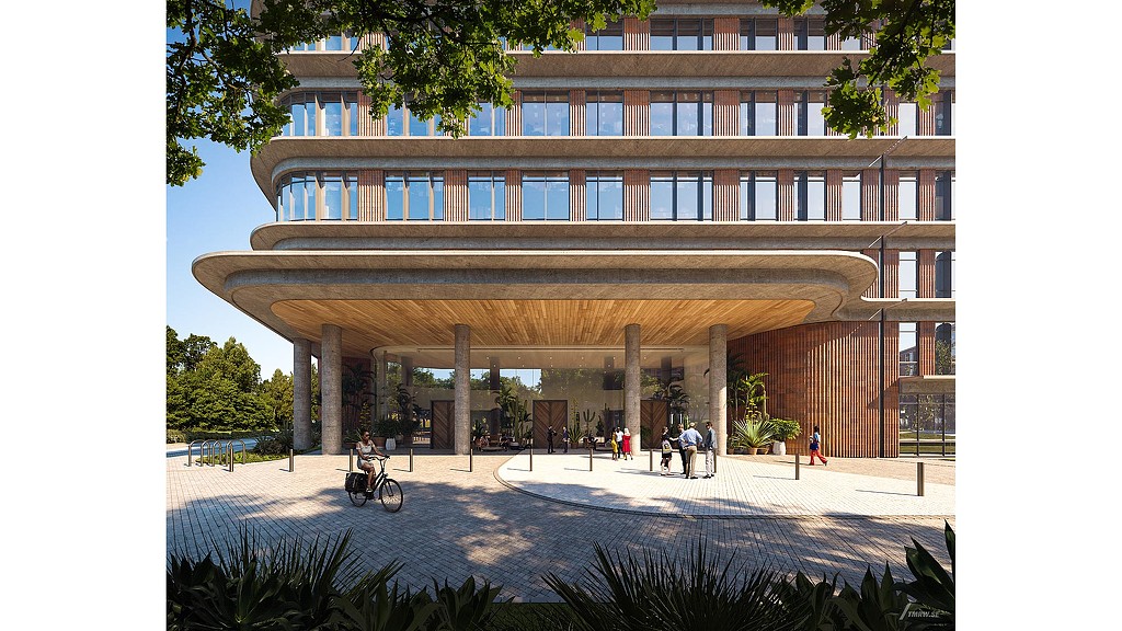 A building with a courtyard and people walking around.