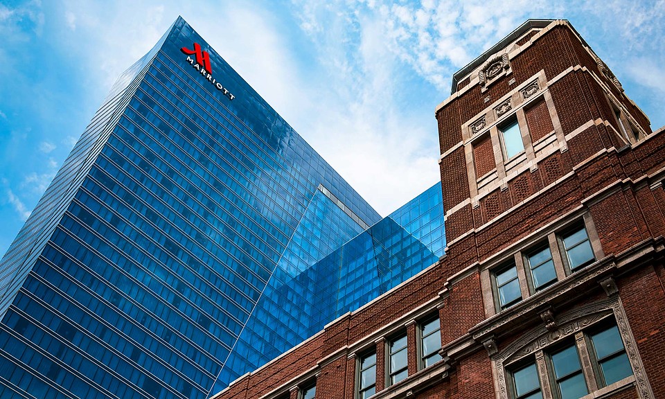 Low Angle Shot of the Marriott Marquis at McCormick Place with Brick Building in Foreground