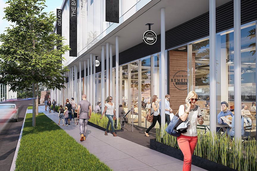 A person walking down a sidewalk.