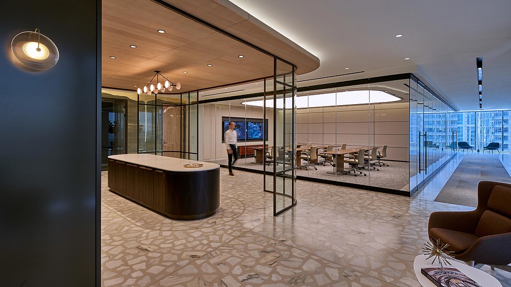 A person walking in a large room.