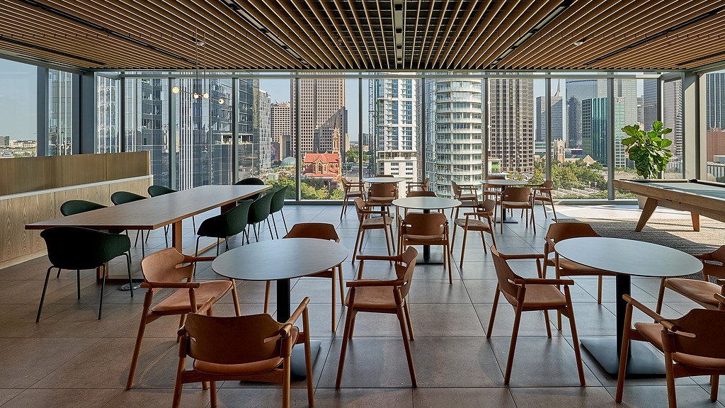 A room with tables and chairs.