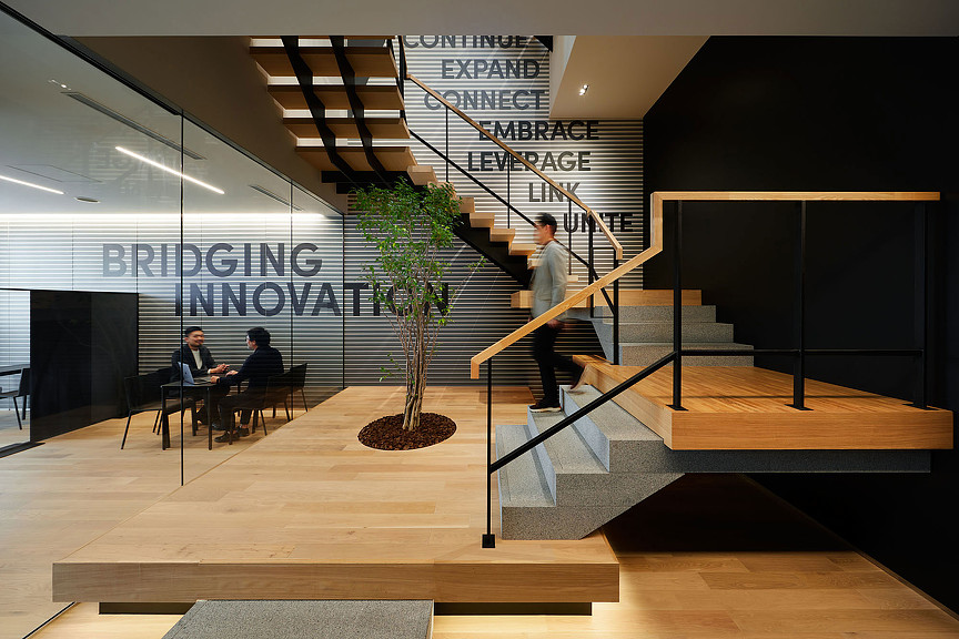 A person walking up a staircase.