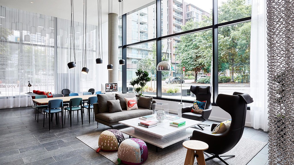 A living room with a large window.