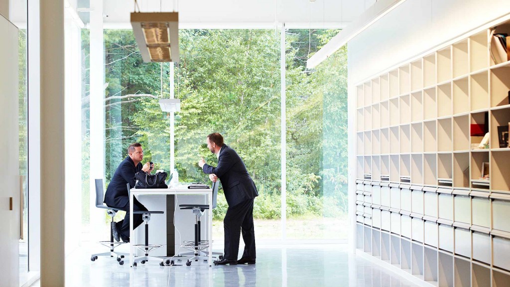 A man sitting at a desk.
