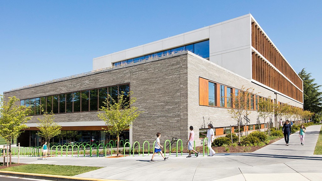 People walking outside of a building.