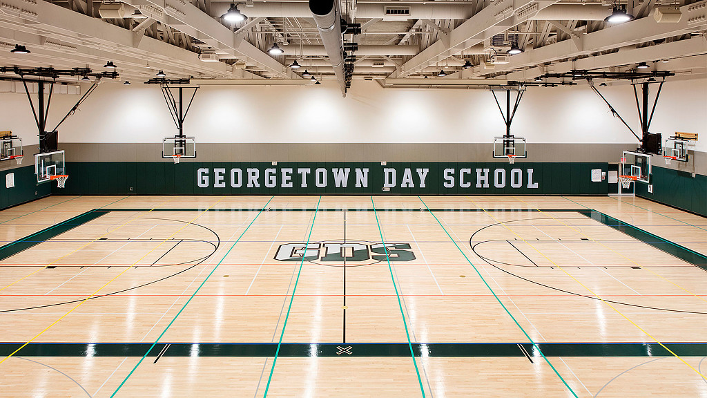 A large empty basketball court.