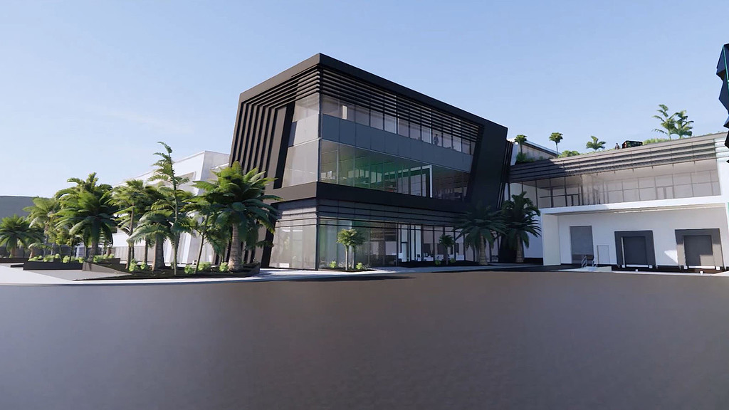 A building with palm trees.