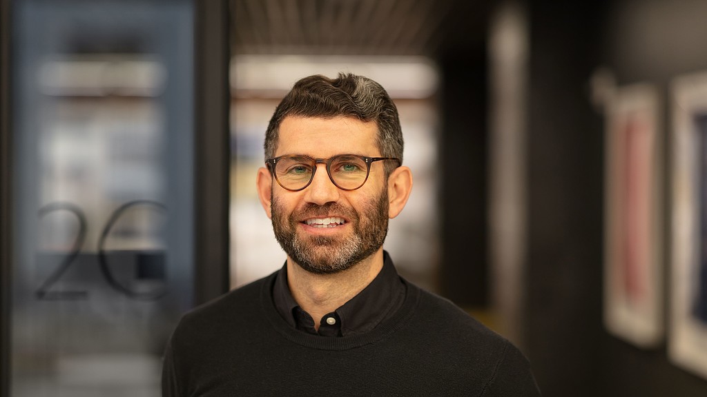 A man wearing glasses.