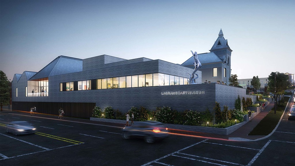 A building with a parking lot.