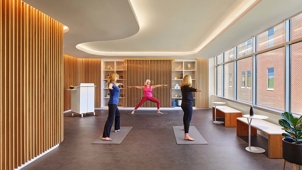 A group of women exercising in a room.