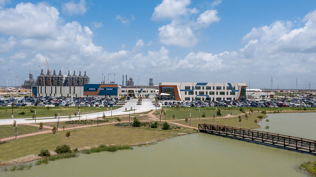 A body of water with buildings along it.
