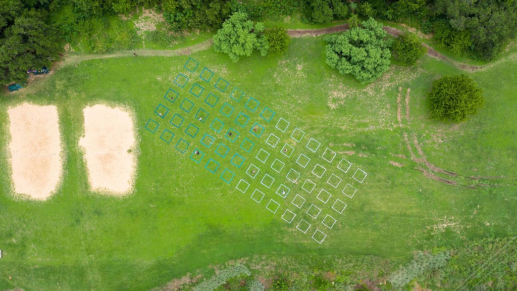 A golf course with a hole in the middle.