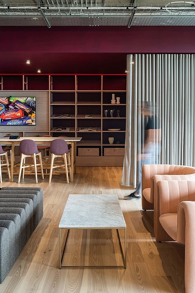 A room with a table and chairs.