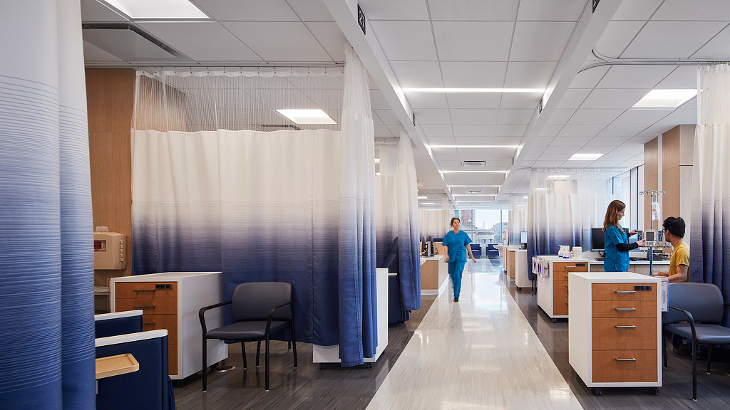 A few people in an office.